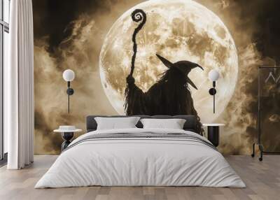 A witch stands in front of a large moon Wall mural