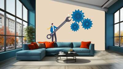 Adjustment and optimization for business improvement, change or fine tune for smooth ride, repair and maintenance service concept, businessman holding wrench to adjust gear cogwheels setting. Wall mural