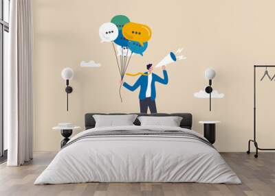 Communication or PR, Public Relations manager to communicate company information and media, announce sales or promotion concept, businessman holding speech bubble balloons while talking on megaphone. Wall mural