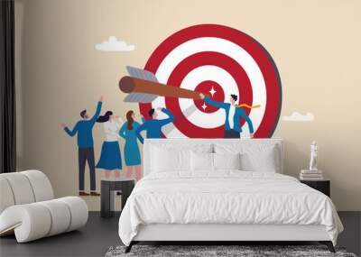 Company target achievement, business goal or objective to achieve, team strategy, leadership development, aiming for winning goal concept, businessman point arrow bullseye target to team colleagues. Wall mural