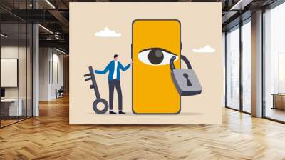 Data privacy for internet user, protect application to track or follow user behavior concept, man holding key after lock the spy eye on smartphone to stop watching private information. Wall mural