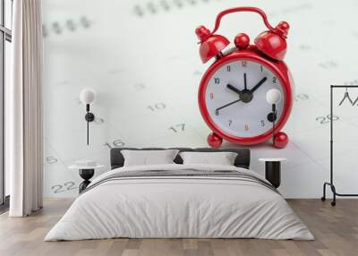 Date and time reminder or deadline concept, small red alarm clock on white clean calendar with number of day, counting down to holiday, vacation or end of month Wall mural