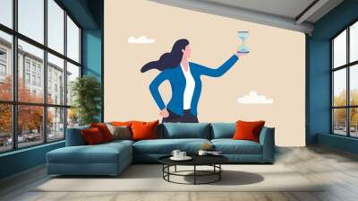 Deadline or time counting down on business project, time management, urgency or time schedule concept, confident businesswoman manager holding hourglass or sandglass as timer or time counting down. Wall mural