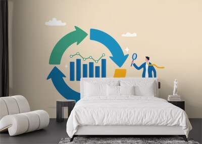 Economic cycle to study up and down on stock market, booming or recession, business cycle for marketing, statistic or data analysis concept, businessman with magnifier on economic cycle diagram. Wall mural