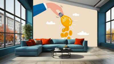 Idea to make money, financial innovation or business or investment ideas, earning or profit from creativity concept, dollar money coins falling from businessman hand shaking the lamp or lightbulb idea Wall mural