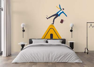 Mistake caution, business risk or problem warning, failure prevention or avoid danger concept, cautious businessman slip falling on exclamation symbol beware, careful caution sign. Wall mural