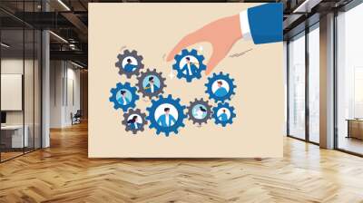 Solution for team, building organization, people management or career development, job position to help success, skill or efficiency concept, businessman hand put new employee to fix cogwheel gears. Wall mural