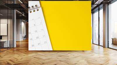 White clean calendar on solid yellow background with copy space, business, travel or project planning concept Wall mural