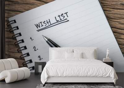 Wish list concept, pen on white paper note pad with handwritten headline as Wish List and numbers listed on wood table in soft tone, things wanted or next time purchase Wall mural