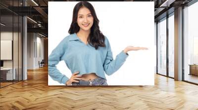 Happy beautiful young asian woman with isolated on white background holding copy space imaginary on beauty palm for insert advertisement, happiness and smile face Attractive beautiful girl portrait Wall mural