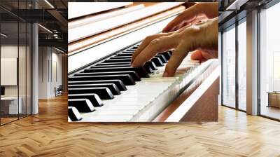 Old person playing the piano. Wrinkled hands. old musician. Wall mural