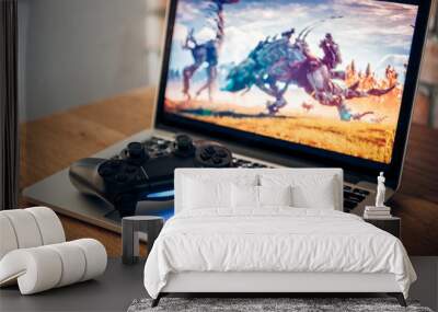 video game controller isolated on the laptop. Wall mural