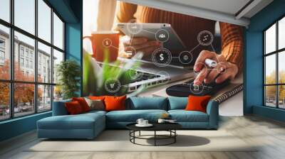 Businessman using mobile phone and laptop computer with business intelligence concept. with VR icon Wall mural