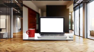 Front view of cup and laptop, smartphone, and tablet on table in office Wall mural