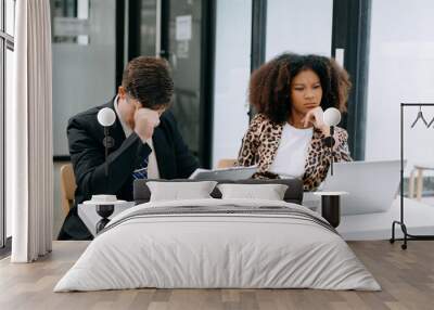 Furious two businesspeople arguing strongly after making a mistake at work  by bad news, upset colleagues in panic after company bankruptcy concept in office. Wall mural