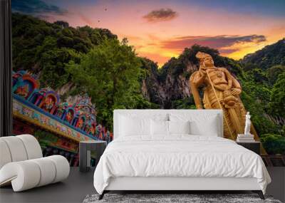 Statue of Lord Muragan and entrance at sunset in Batu Caves, Kuala Lumpur, Malaysia. Wall mural