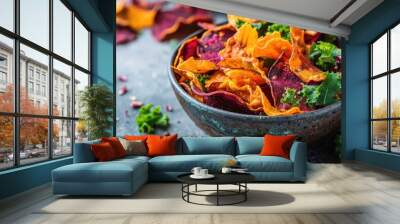 A bowl of crunchy vegetable chips made from sweet potatoes, beets, and kale. Wall mural