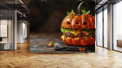 A creatively designed pumpkin-shaped burger for Halloween, sitting on a textured stone background. Perfect for festive holiday meal ideas. Wall mural