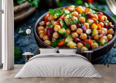 Bowl of chickpea and kidney bean salad with fresh veggies, a sprinkle of herbs, and a dash of mild spices, perfect for a light and nutritious meal. Wall mural