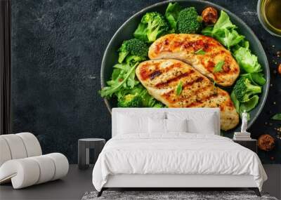 Golden roast chicken breast, grilled to perfection, served with crisp salad greens and tender broccoli. A wholesome, health-conscious meal focused on nutrition Wall mural