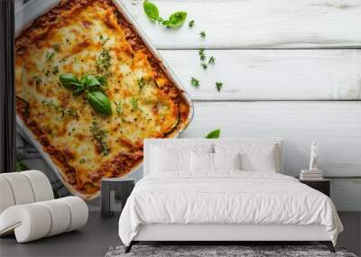 Healthy zucchini lasagna with rich bolognese sauce in a baking dish on a rustic white wooden background, garnished with herbs, top view, selective focus, inviting meal Wall mural