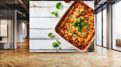 Healthy zucchini lasagna with rich bolognese sauce in a baking dish on a rustic white wooden background, garnished with herbs, top view, selective focus, inviting meal Wall mural