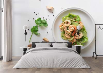 Healthy food stir fried shrimp lemon garlic in bowl on white table. Wall mural