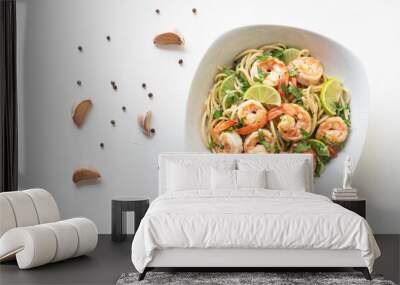 Shrimp pasta lemon coriander in white bowl on white background Italian food. Wall mural