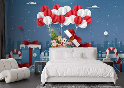 Origami Paper art of cute Christmas character on balloon in town with snowing, Merry Christmas and Happy New Year Wall mural