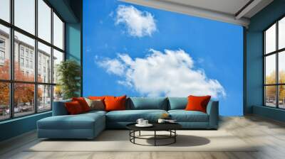 Beautiful cumulus clouds against the blue daytime sky. Wall mural