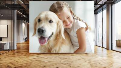 A child with a dog at home.  Wall mural