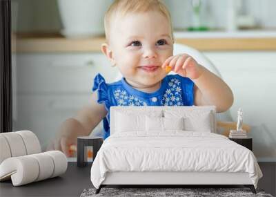 A little baby eats   Wall mural