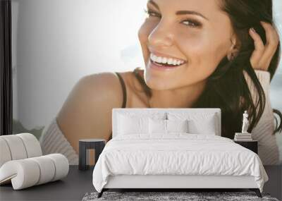 Beautiful woman smiling  Wall mural