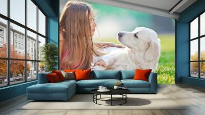 Happy kid with labrador in a nature Wall mural