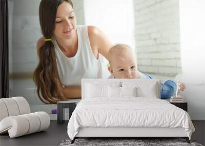 Mom plays with the baby   Wall mural