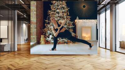 Yoga Christmas. Yoga class at home.  Wall mural