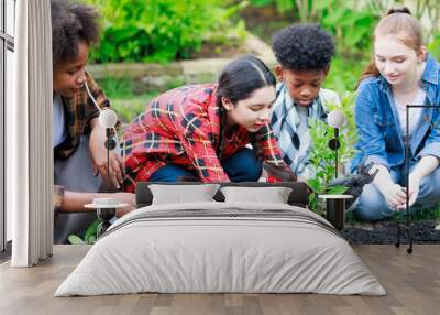 diverse teenage boy and girls Learn to grow vegetables. Divers kids children ethnic girl and boy happy laughing fun together outdoors at camp farm. Wall mural