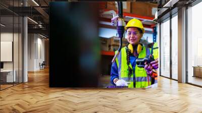 Female and male industrial factory engineer and technician worker wearing safety vest and hard hat helmet. Metal lathe industrial manufacturing factory. Opertor automation robot welding machine Wall mural