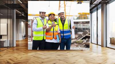 Group of Ethnic diversity worker people, Success teamwork. Group of professional engineering people wearing hardhat safety helmet meeting. Unity and teamwork concept. Afrian fat female and hispanic Wall mural