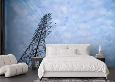 high voltage post.High-voltage tower sky background. Wall mural