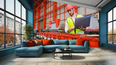 lathe and stamping metal machine. Hispanic man and Factory engineer in hard hat helmet working on digital teblet computer at Heavy Industry Manufacturing Factory. Wall mural