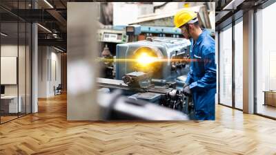 Mechanical Engineering control lathe machine in factory facility. Safety First at work place. Wall mural