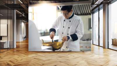 portrait asian thai male chef. Cooking class. culinary classroom. cooking school. cooking lessons in a cooking school. Wall mural