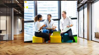 Teamwork concept. Three business people in the office working together Wall mural