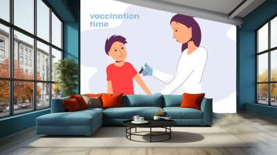 Doctor vaccinates a child, a boy from covid-19, the boy will be healthy, vaccination time Wall mural