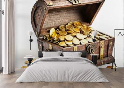 Open treasure chest filled with gold coins isolated on white Wall mural