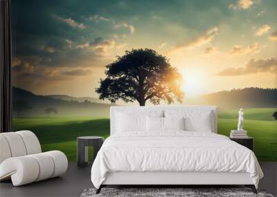 Spiritual healing life concept: Silhouette alone tree on beauty meadow landscape wallpaper background Wall mural