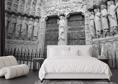 Close up of artwork and carvings in the Notre Dame Cathedral, situated on the Seine River in Paris, France Wall mural