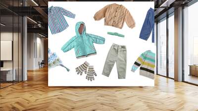 Child's fashion autumn clothes set. Knitted cardigan,shirt trousers isolated on white. Winter collection boy's clothing. Wall mural