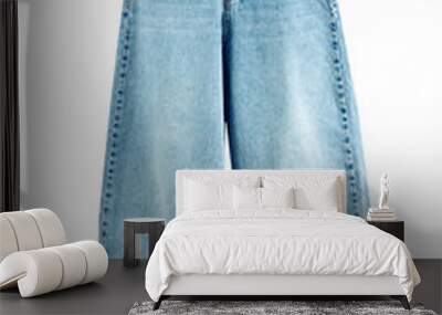 Fashion trendy women's jeans isolated on white.Baggy, white leg jeans. Wall mural